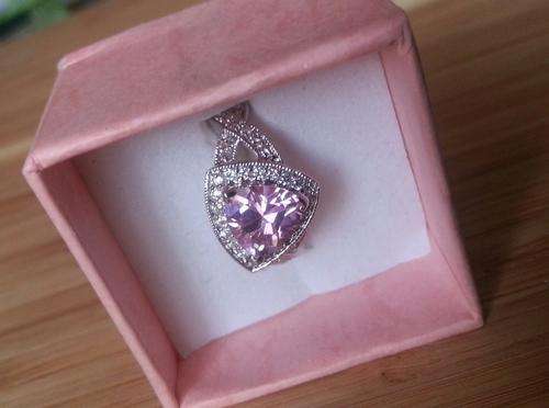 925 Sterling silver with pink stone